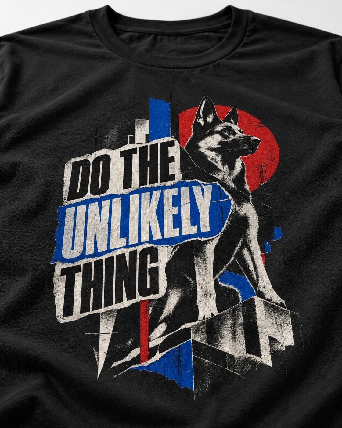 Do The Unlikely Thing Torn Poster German Shepherd Dog Graphic T-Shirt in Black, close-up of the graphic