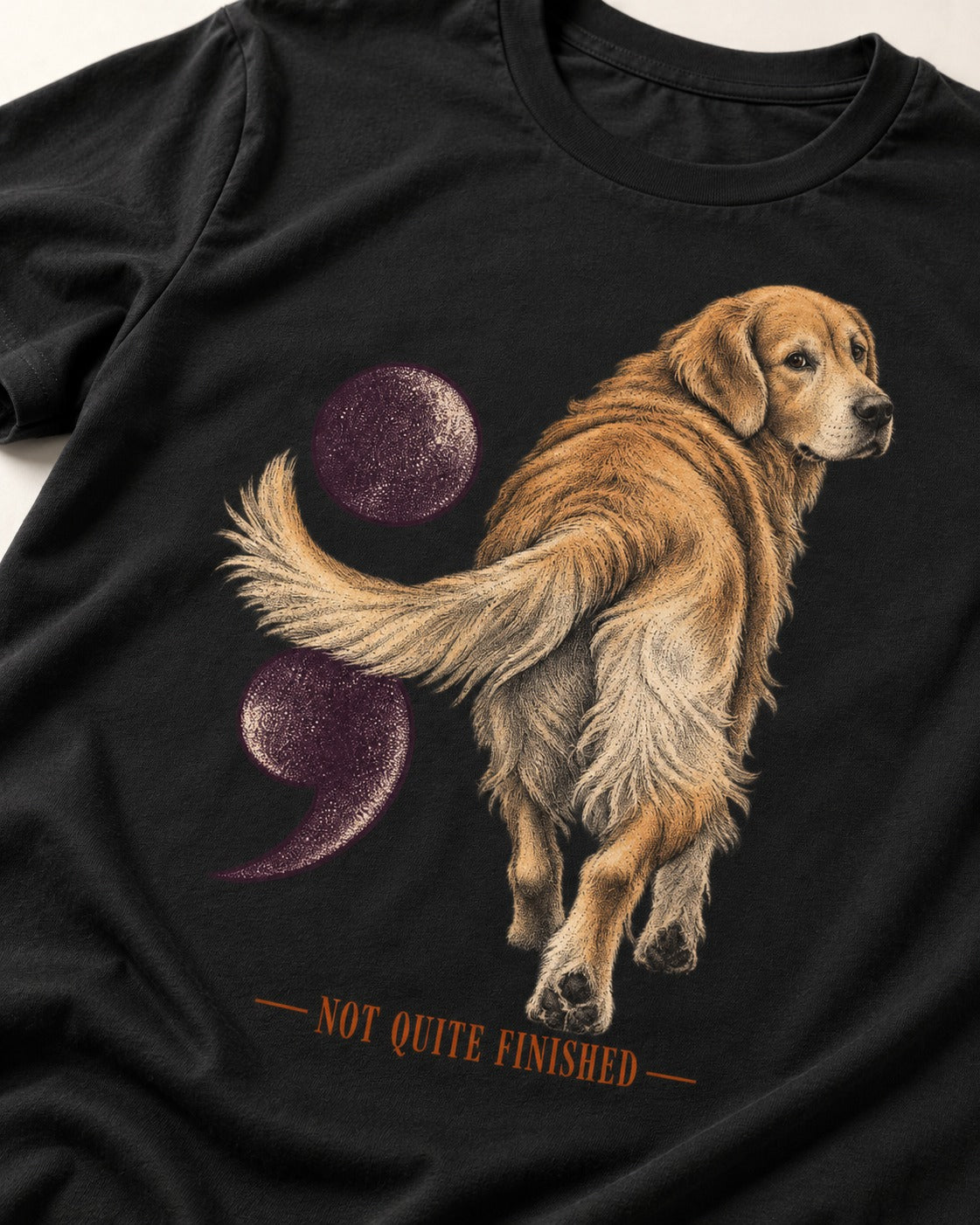 Golden Retriever Not Quite Finished Semicolon Graphic T-Shirt in Black, close-up of the graphic