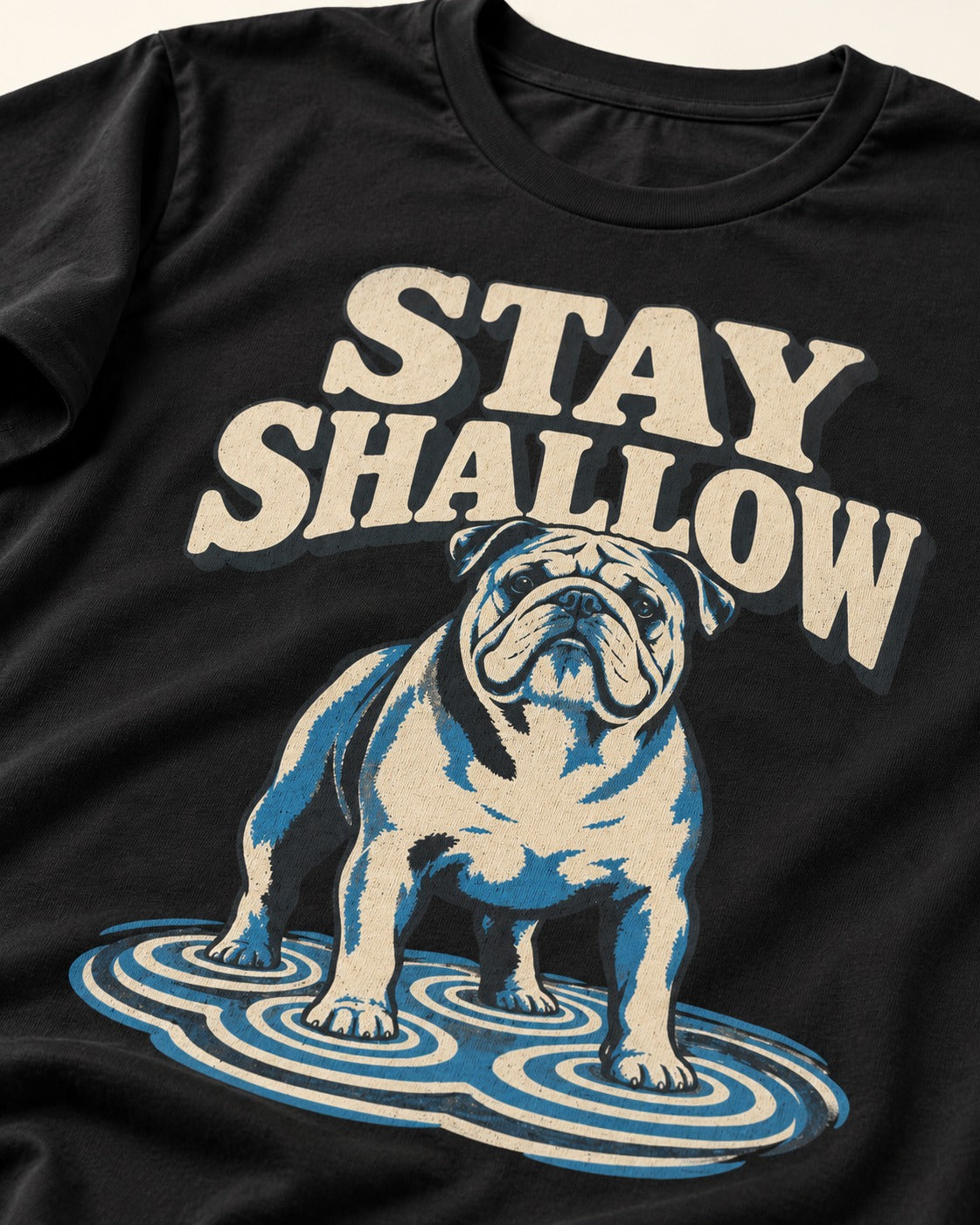 English Bulldog Stay Shallow Ripple Graphic T-Shirt in Black, close-up of the graphic