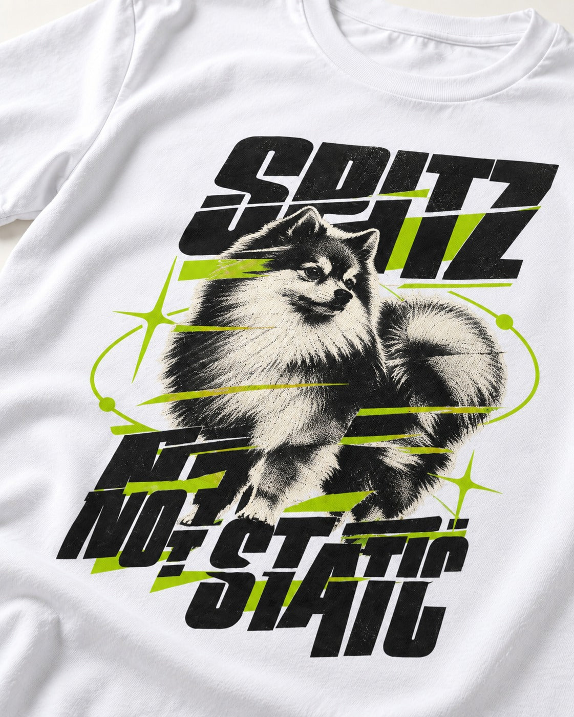 Pomeranian Not Static T-Shirt in White, close-up of the graphic