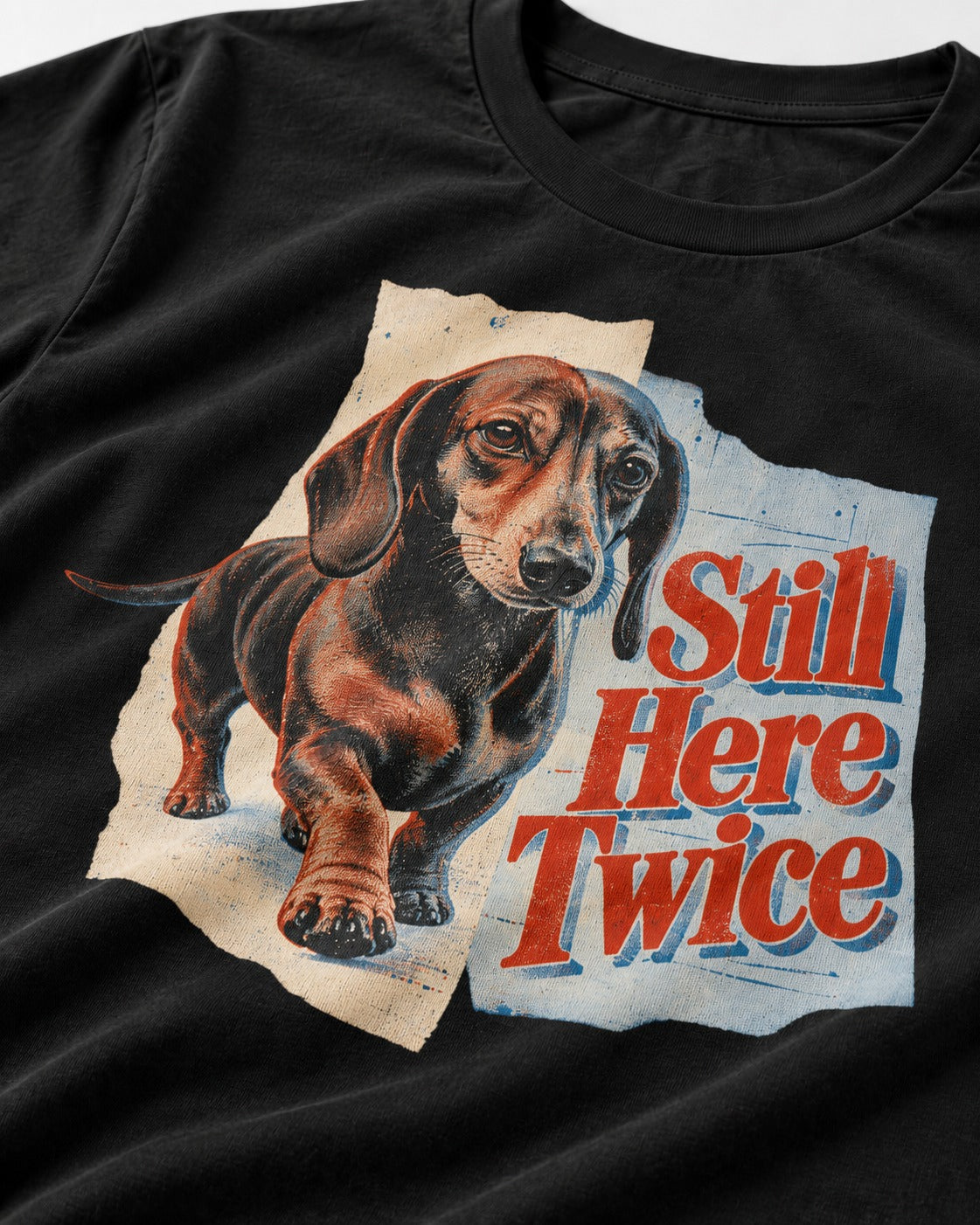 Dachshund Still Here Twice Torn Paper Graphic T-Shirt in Black, close-up of the graphic