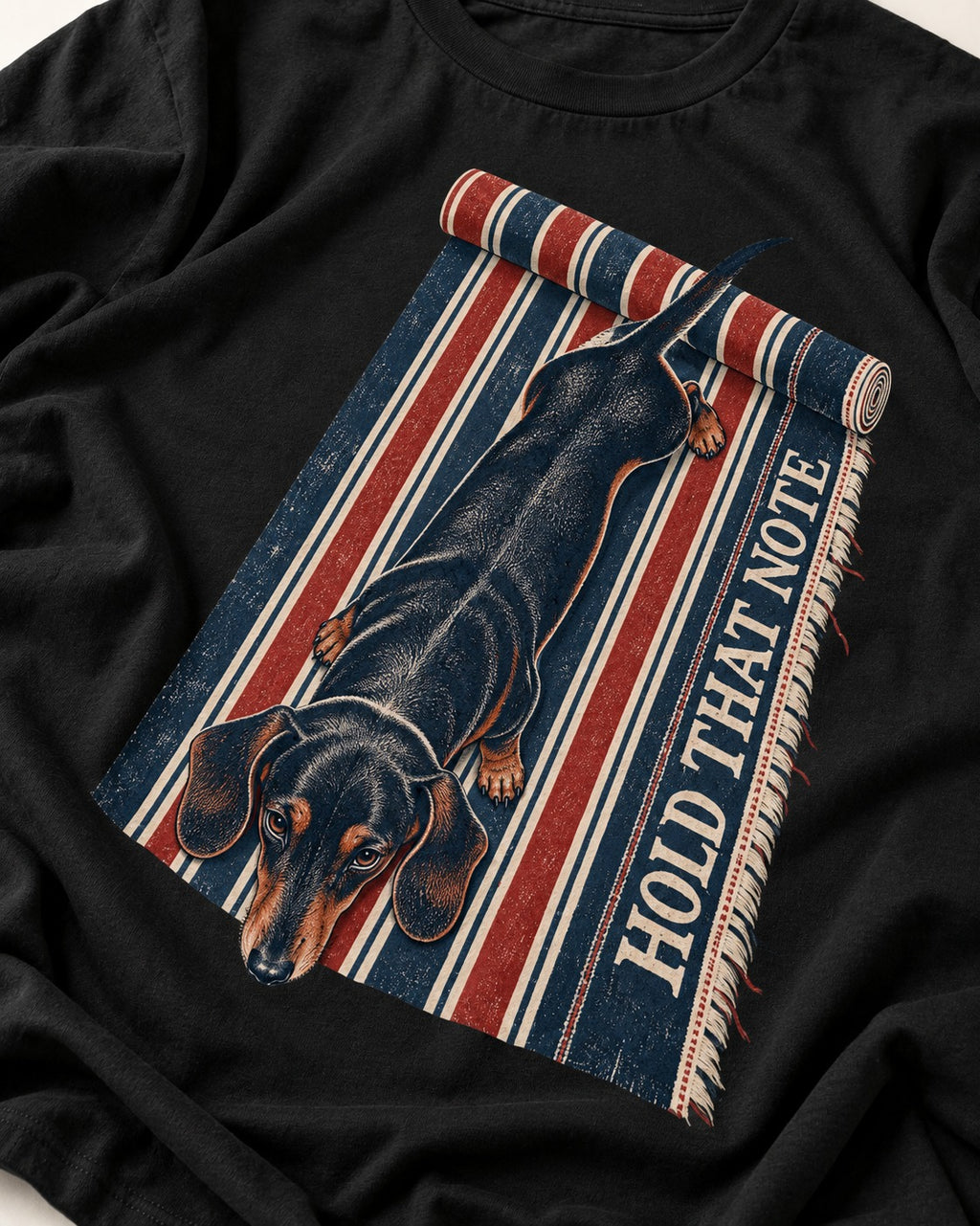 Dachshund Hold That Note Striped Rug Graphic T-Shirt in Black, close-up of the graphic
