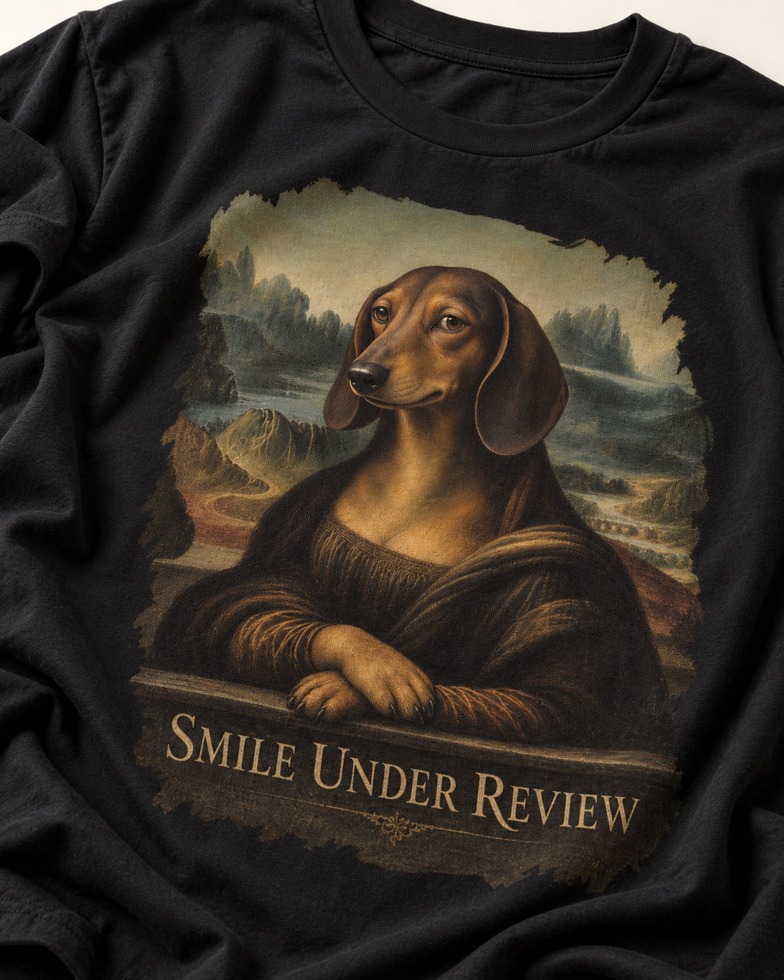 Dachshund Smile Under Review Mona Lisa Graphic T-Shirt in Black, close-up of the graphic