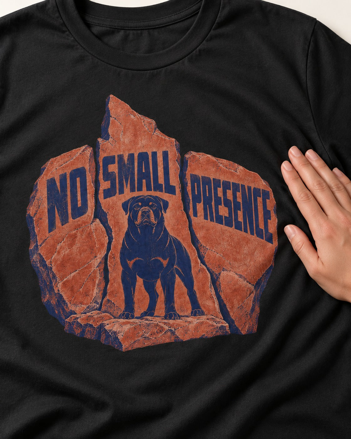 Rottweiler No Small Presence Monument Rock Graphic T-Shirt in Black, close-up of the graphic