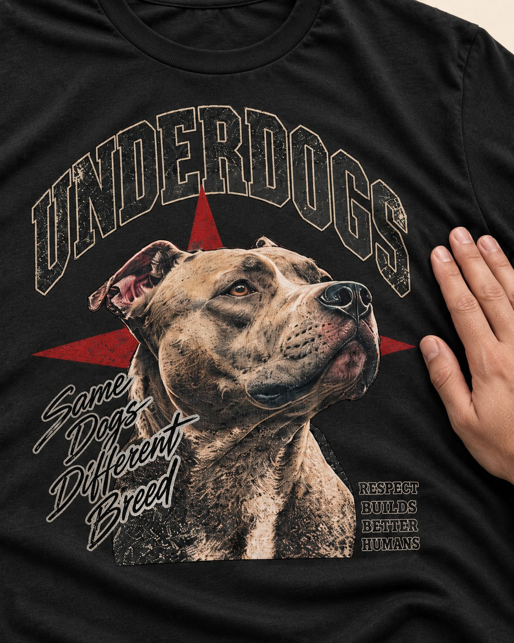 Pitbull Underdogs Same Dogs Different Breed Portrait Graphic T-Shirt in Black, close-up of the graphic