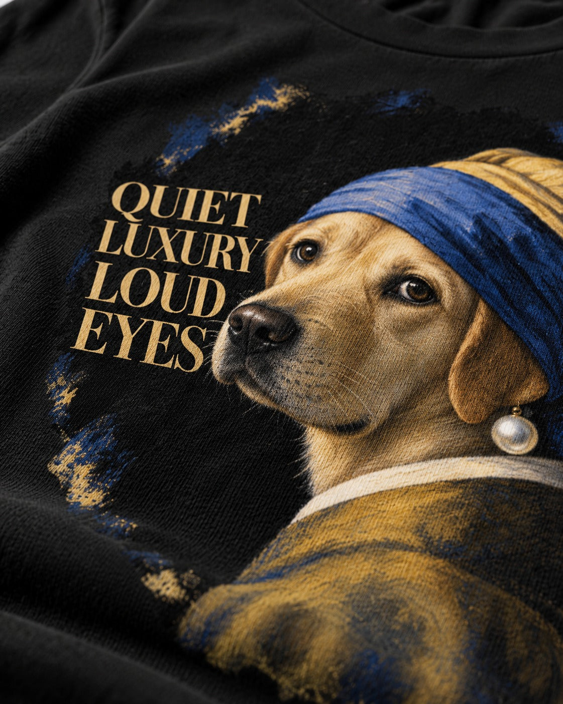 Labrador Retriever Quiet Luxury Loud Eyes Pearl Earring Graphic T-Shirt in Black, close-up of the graphic