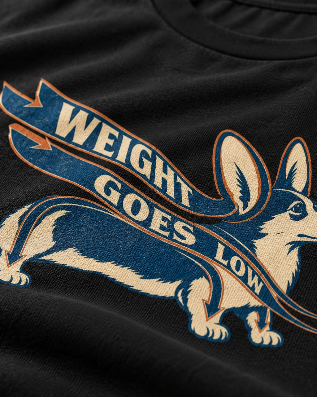 Corgi Weight Goes Low Ribbon Arrow Graphic T-Shirt in Black, close-up of the graphic