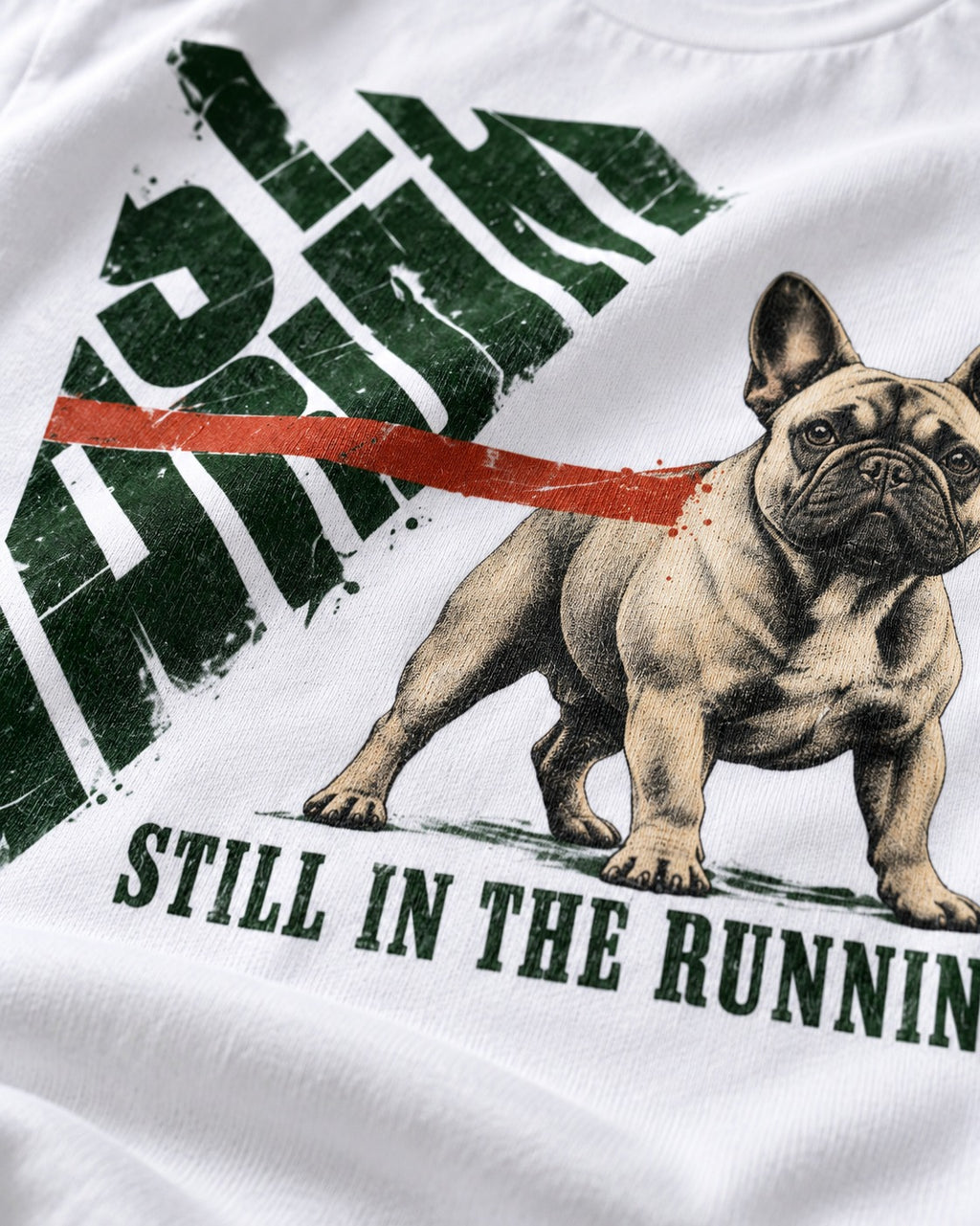 Frenchie Still in the Running T-Shirt in White, close-up of the graphic