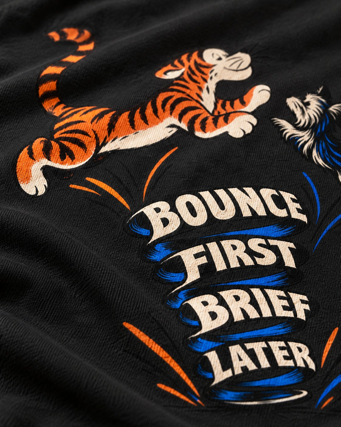Yorkshire Terrier Bounce First Brief Later Tiger Graphic T-Shirt in Black, close-up of the graphic