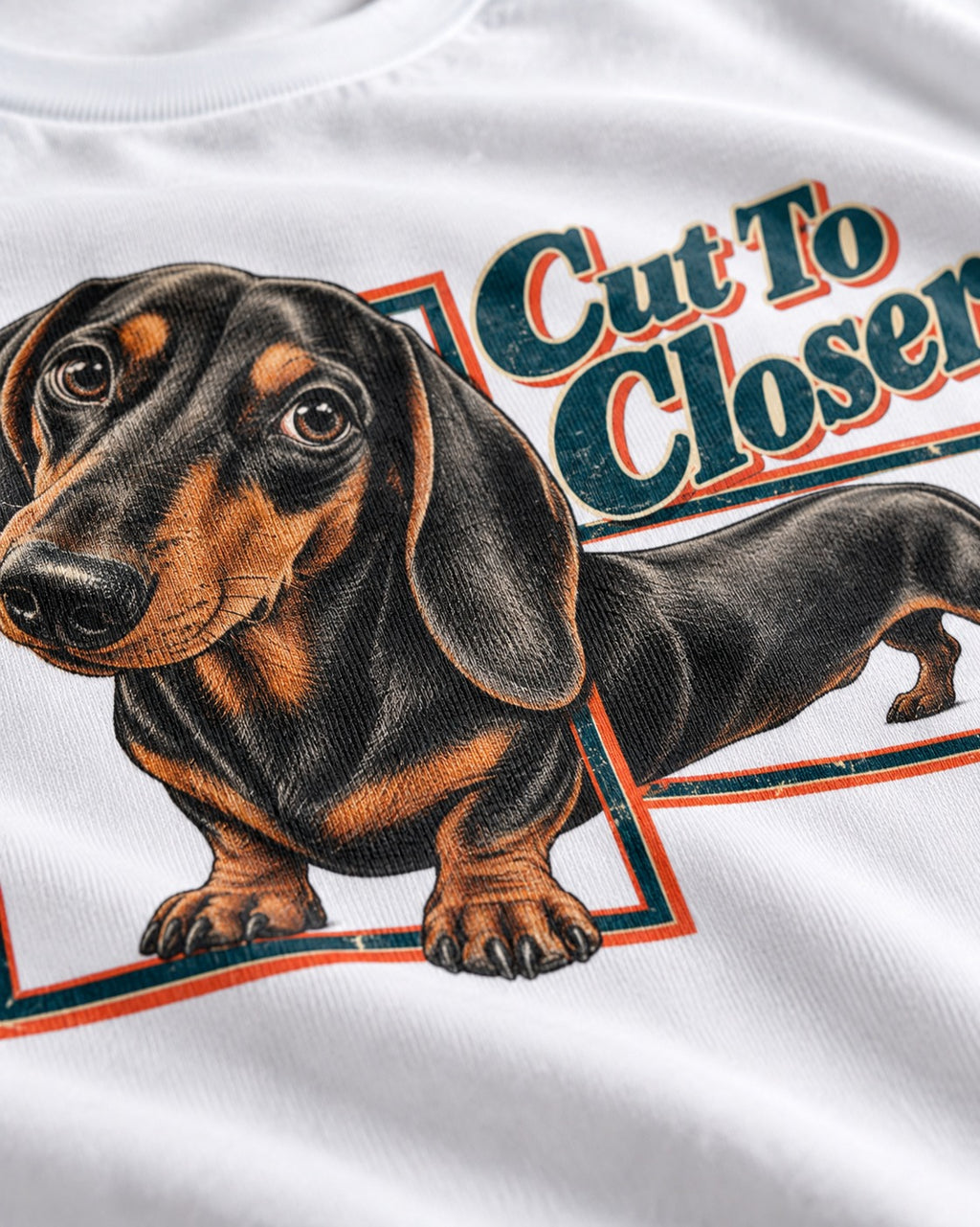 Dachshund Cut to Closer T-Shirt in White, close-up of the graphic