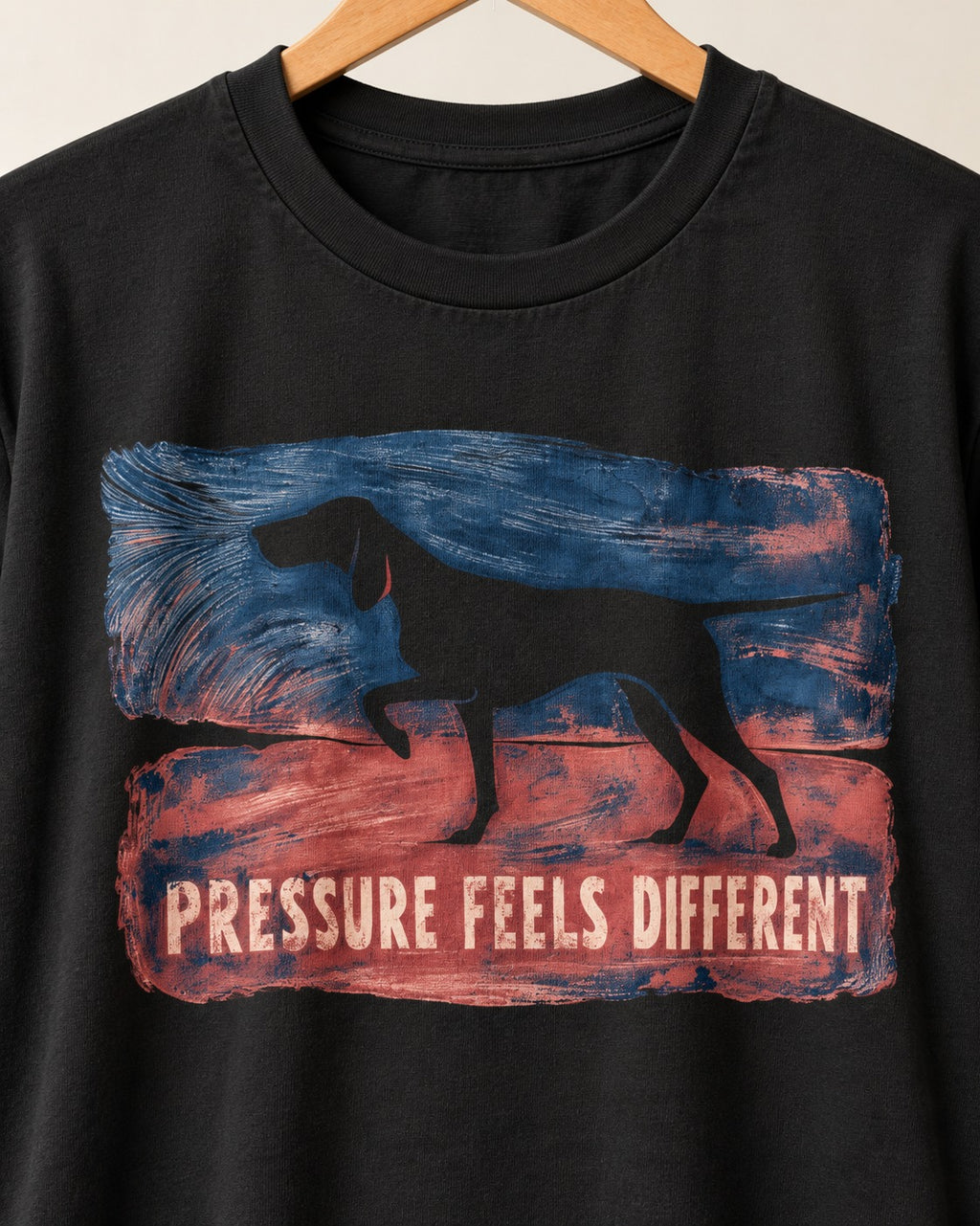 German Shorthaired Pointer Pressure Feels Different Monotype Graphic T-Shirt in Black, close-up of the graphic