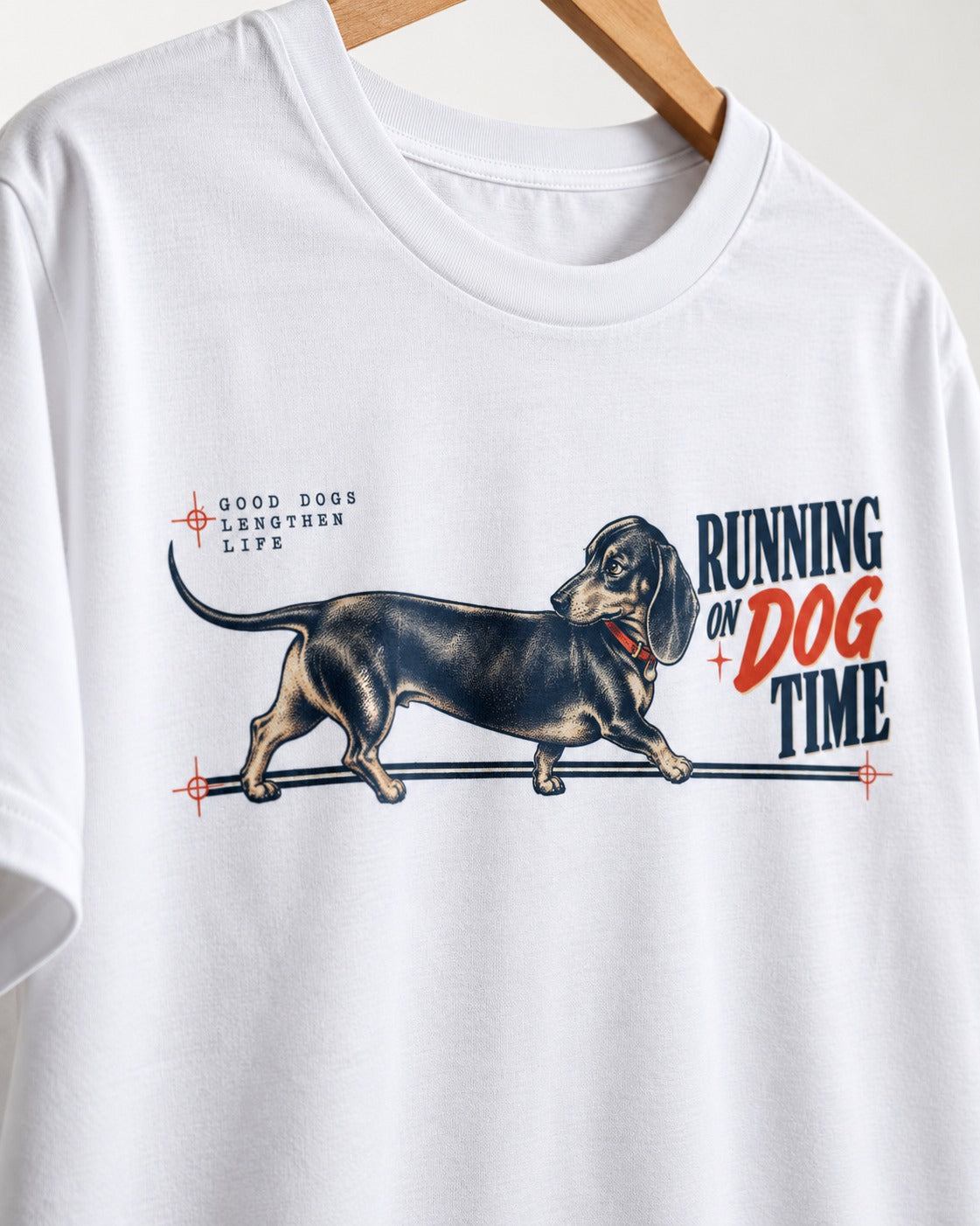 Dachshund Lengthens Life T-Shirt in White, close-up of the graphic