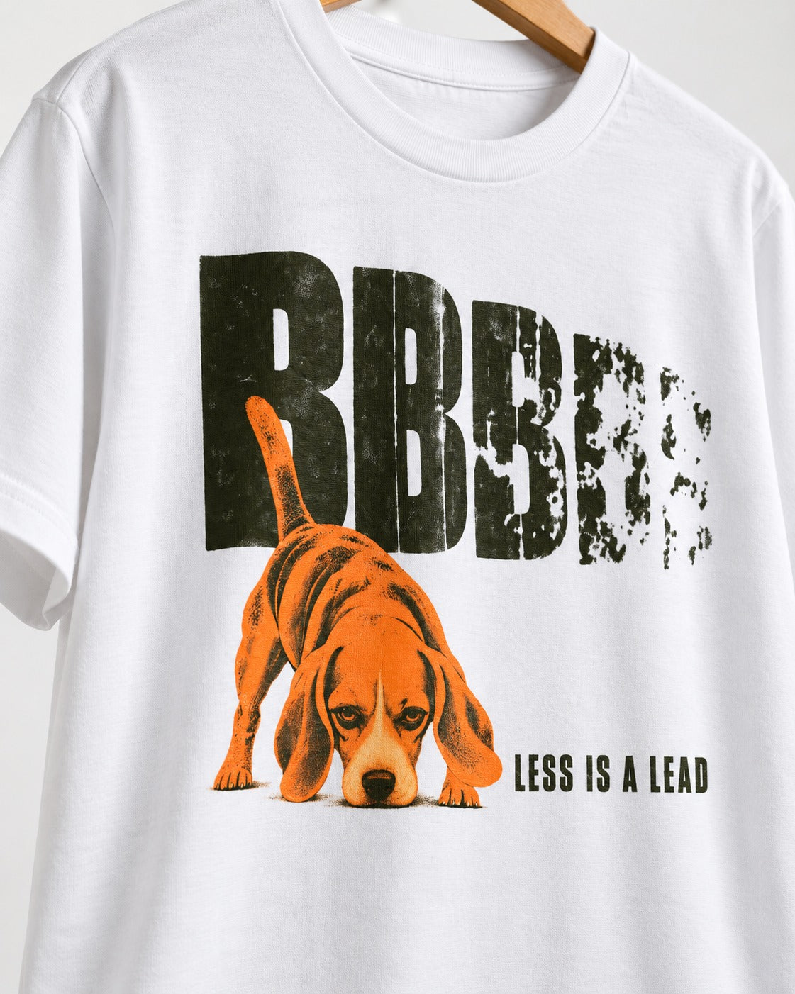 Less Is a Lead Beagle T-Shirt in White, close-up of the graphic