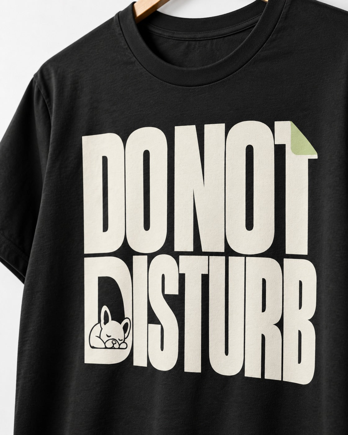 Frenchie Do Not Disturb Hidden Sleeping Graphic T-Shirt in Black, close-up of the graphic