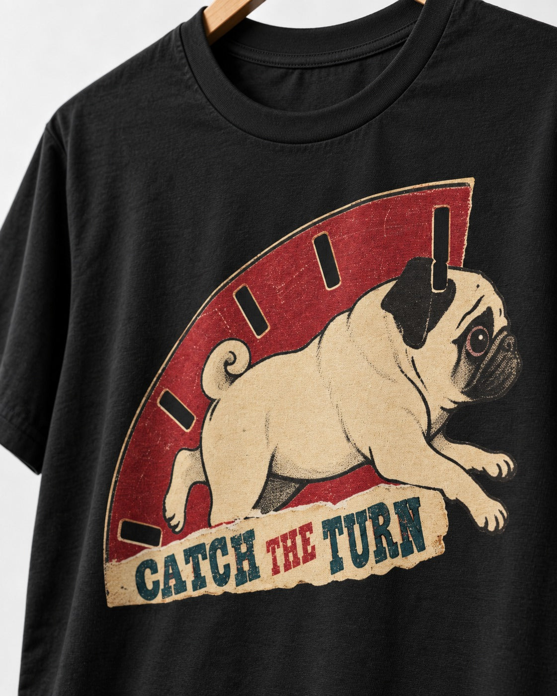 Pug Catch the Turn Track Graphic T-Shirt in Black, close-up of the graphic
