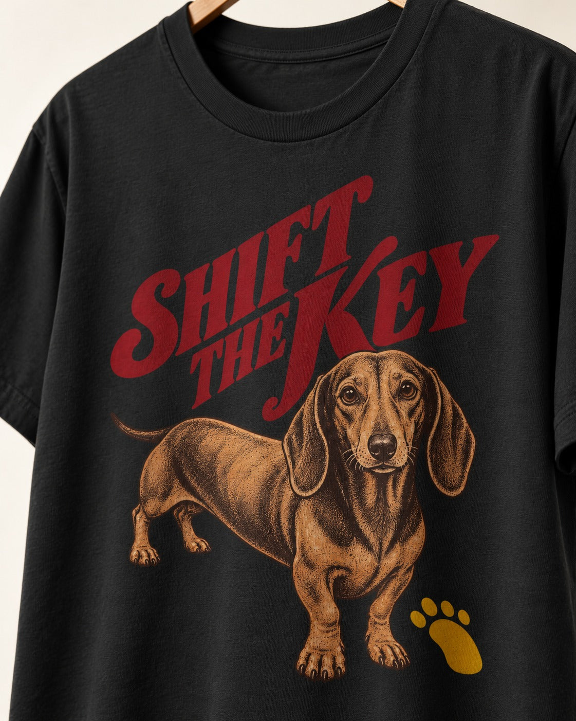Dachshund Shift The Key Pawprint Graphic T-Shirt in Black, close-up of the graphic