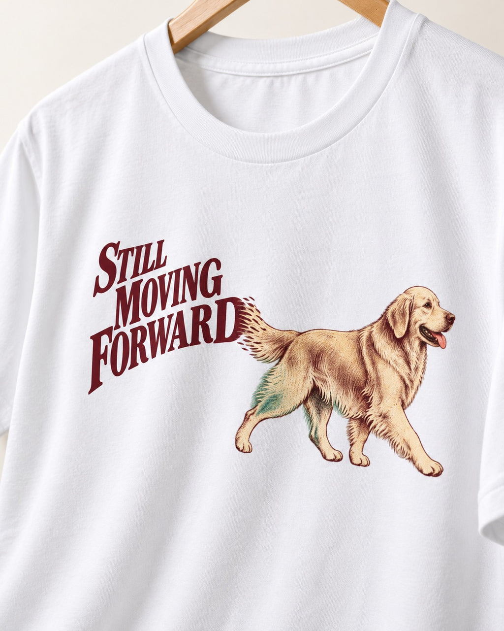 Golden Retriever Still Moving Forward T-Shirt in White, close-up of the graphic