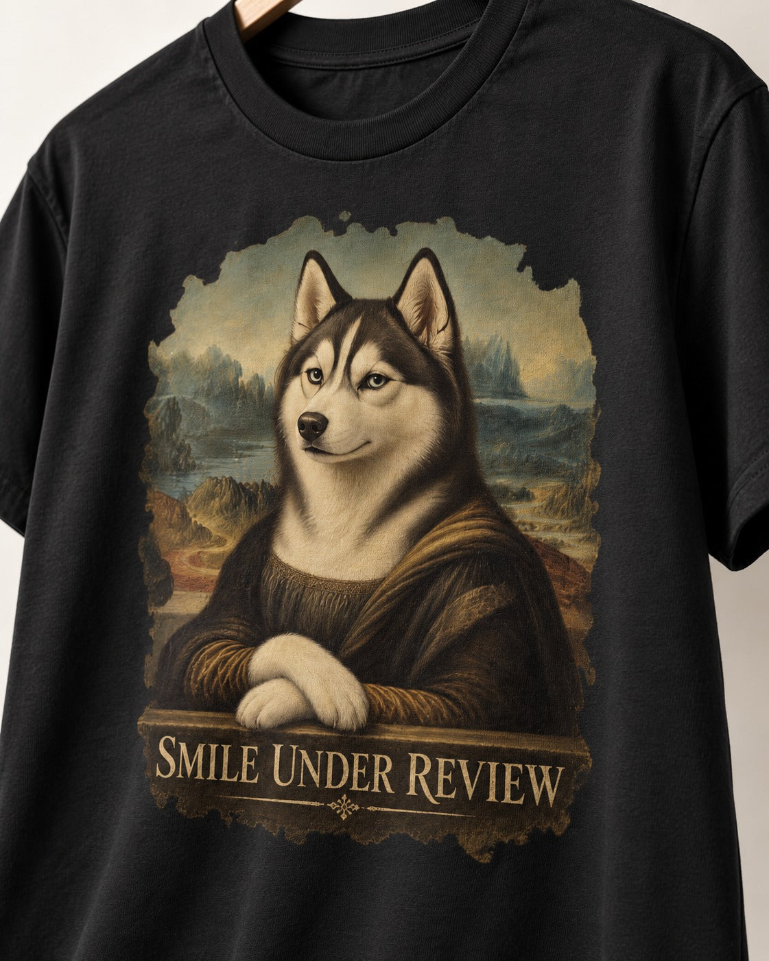 Husky Smile Under Review Renaissance Portrait Graphic T-Shirt in Black, close-up of the graphic