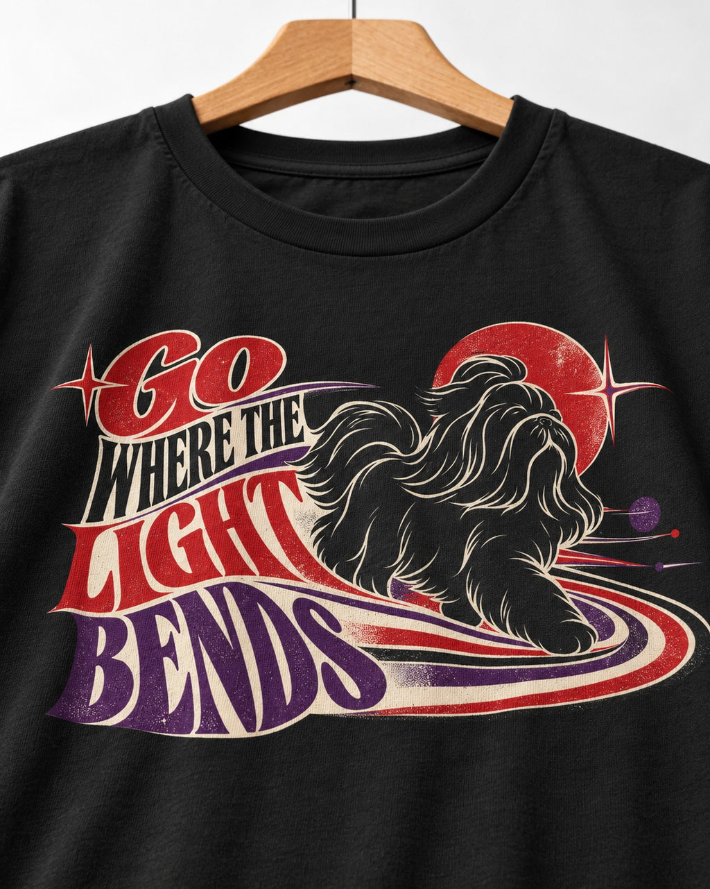 Shih Tzu Go Where the Light Bends Cosmic Orbit Graphic T-Shirt in Black, close-up of the graphic