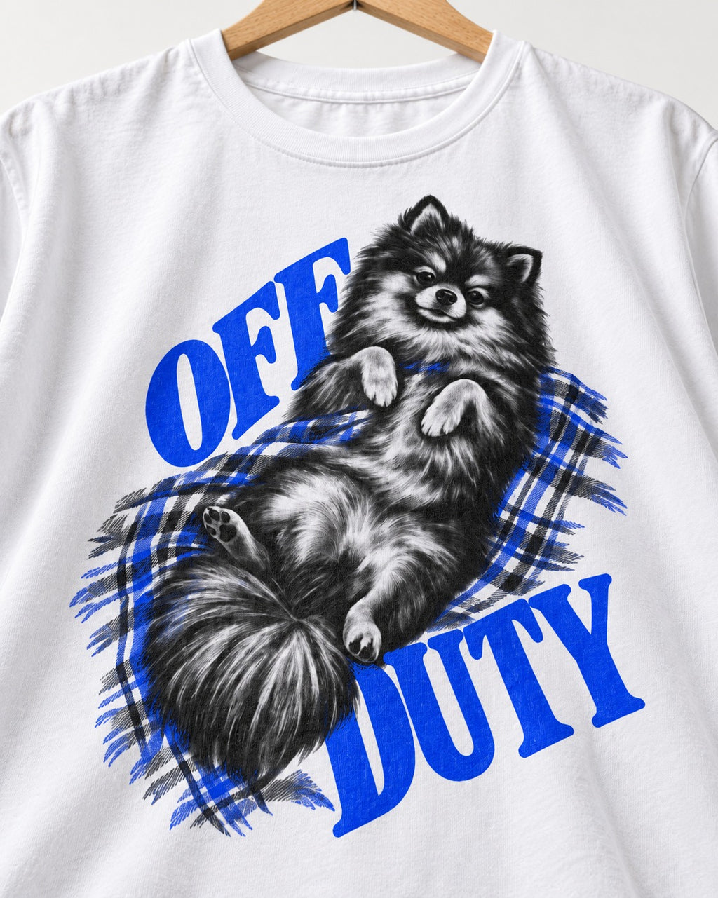 Off Duty Pomeranian T-Shirt in White, close-up of the graphic