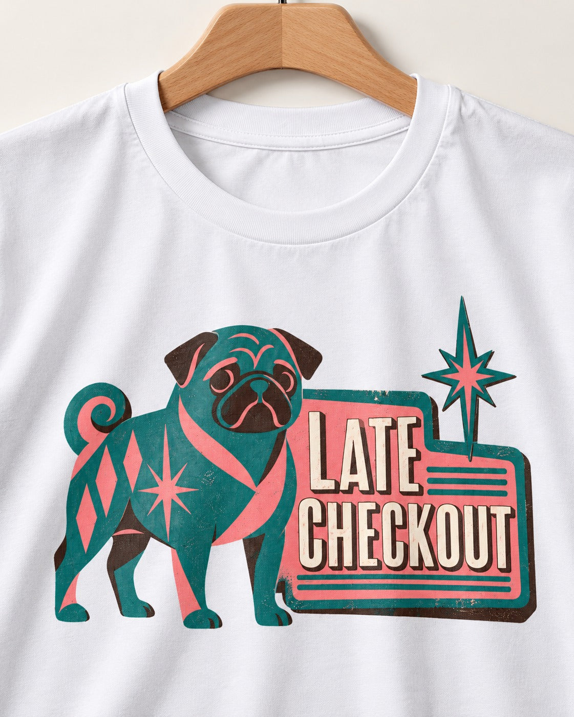 Pug's Late Checkout T-Shirt in White, close-up of the graphic