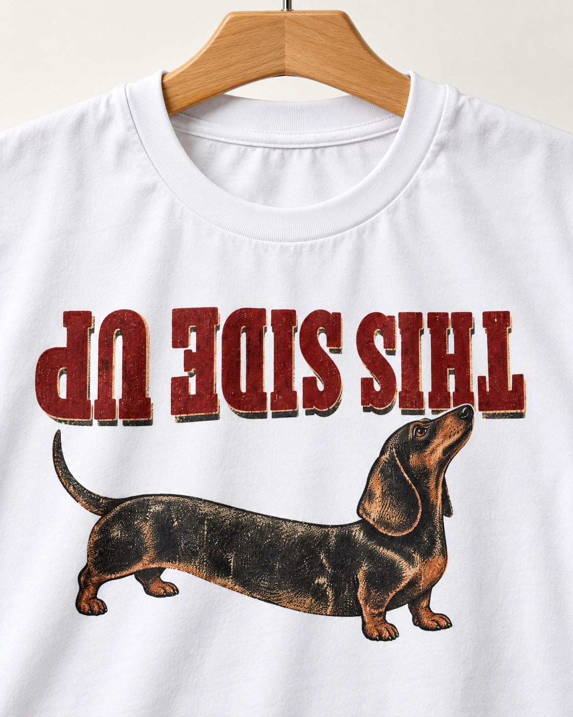 This Side Up Dachshund T-Shirt in White, close-up of the graphic