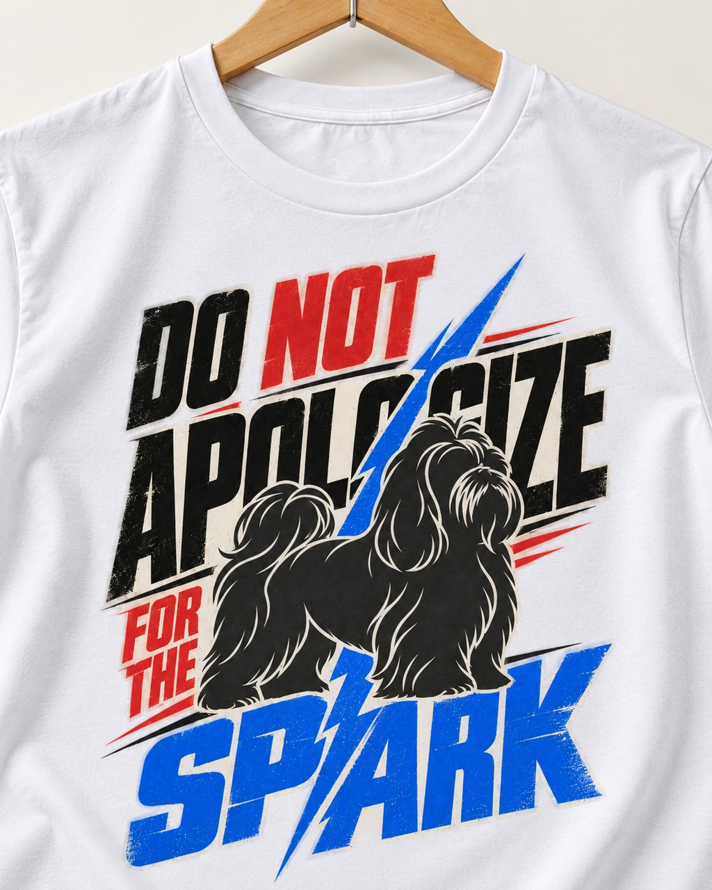 Never Apologize for Shih Tzu Spark T-Shirt in White, close-up of the graphic