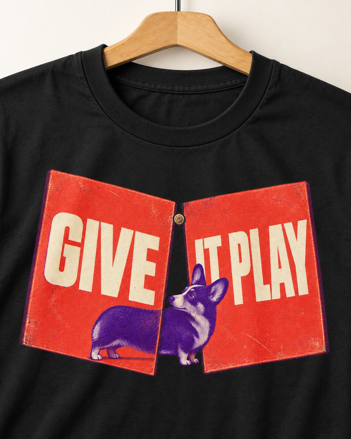 Corgi Give It Play Folding Panels T-Shirt in Black, close-up of the graphic
