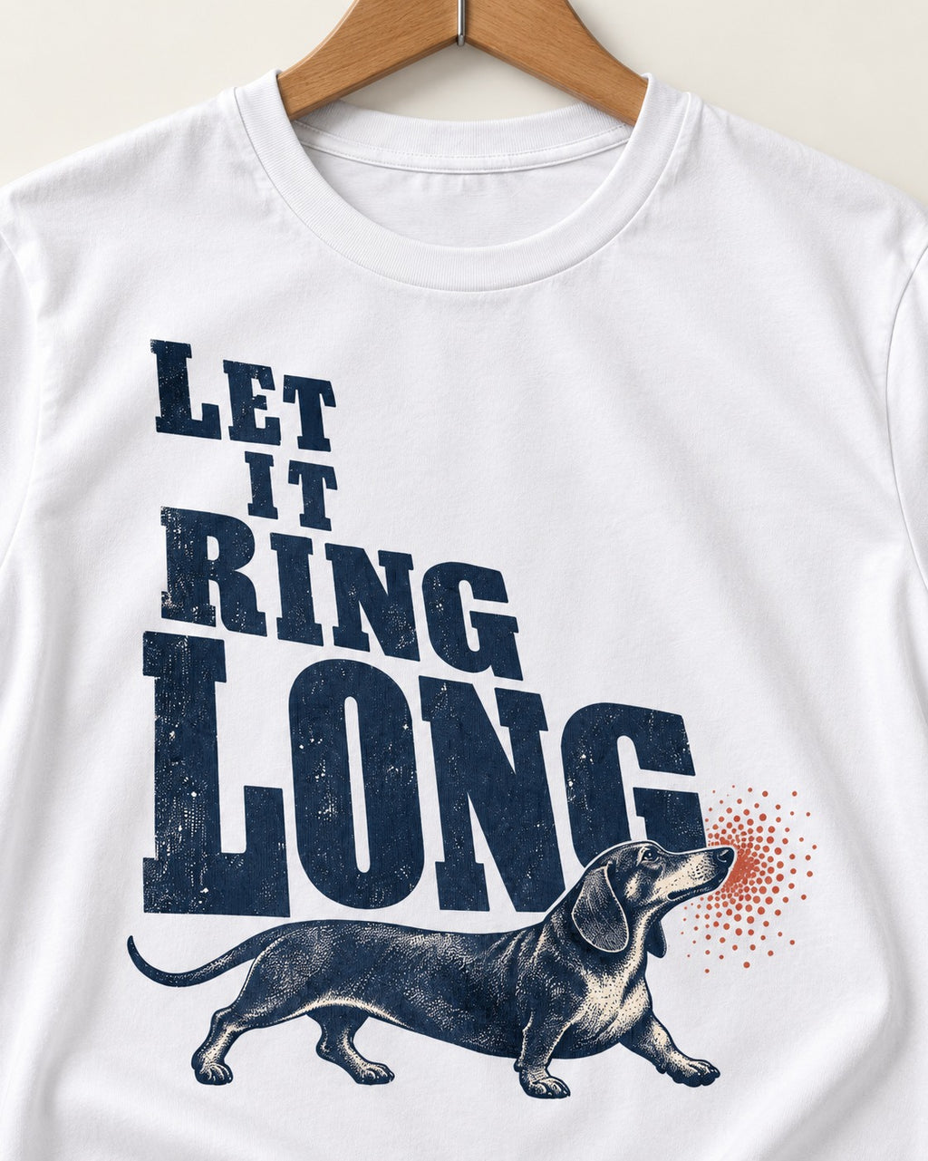 Let It Ring Long Dachshund T-Shirt in White, close-up of the graphic