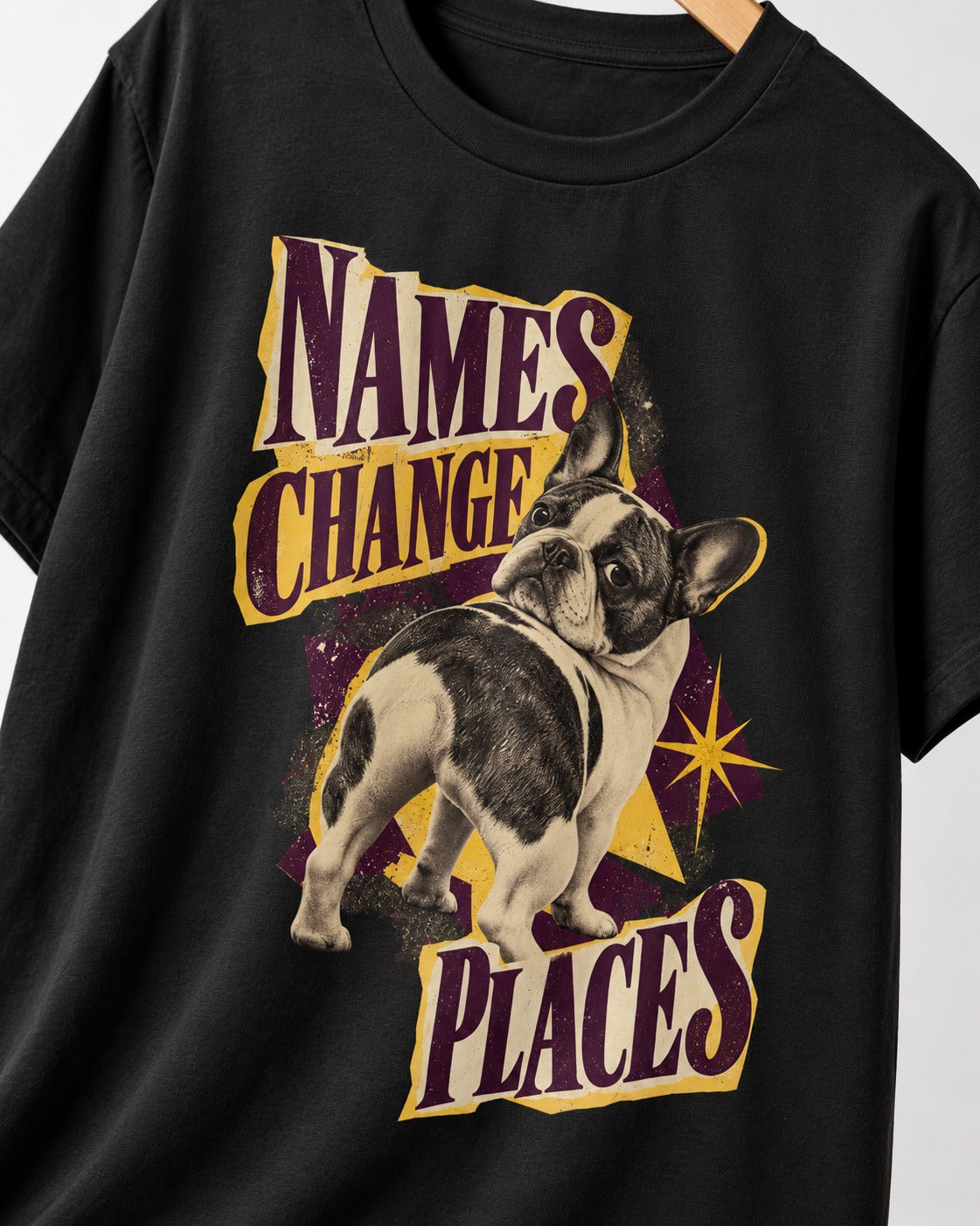 Frenchie Names Change Places Purple Poster Graphic T-Shirt in Black, close-up of the graphic