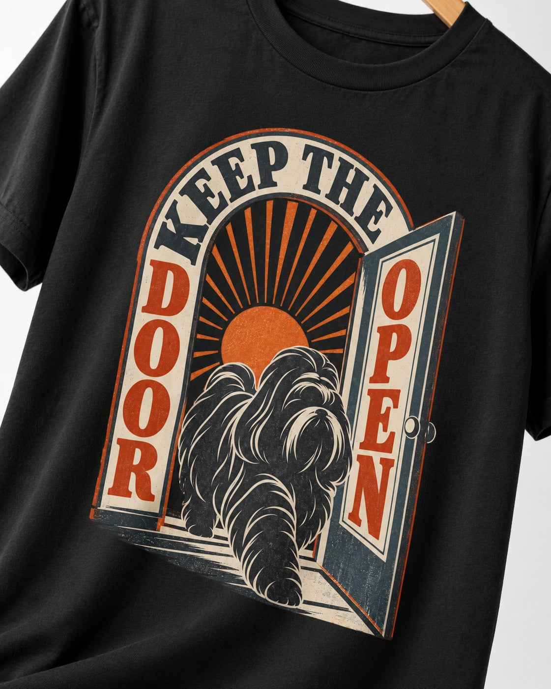 Shih Tzu Keep the Door Open Retro Doorway Graphic T-Shirt in Black, close-up of the graphic