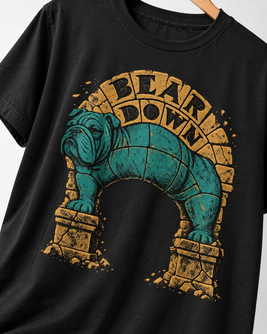 English Bulldog Bear Down Stone Arch Graphic T-Shirt in Black, close-up of the graphic