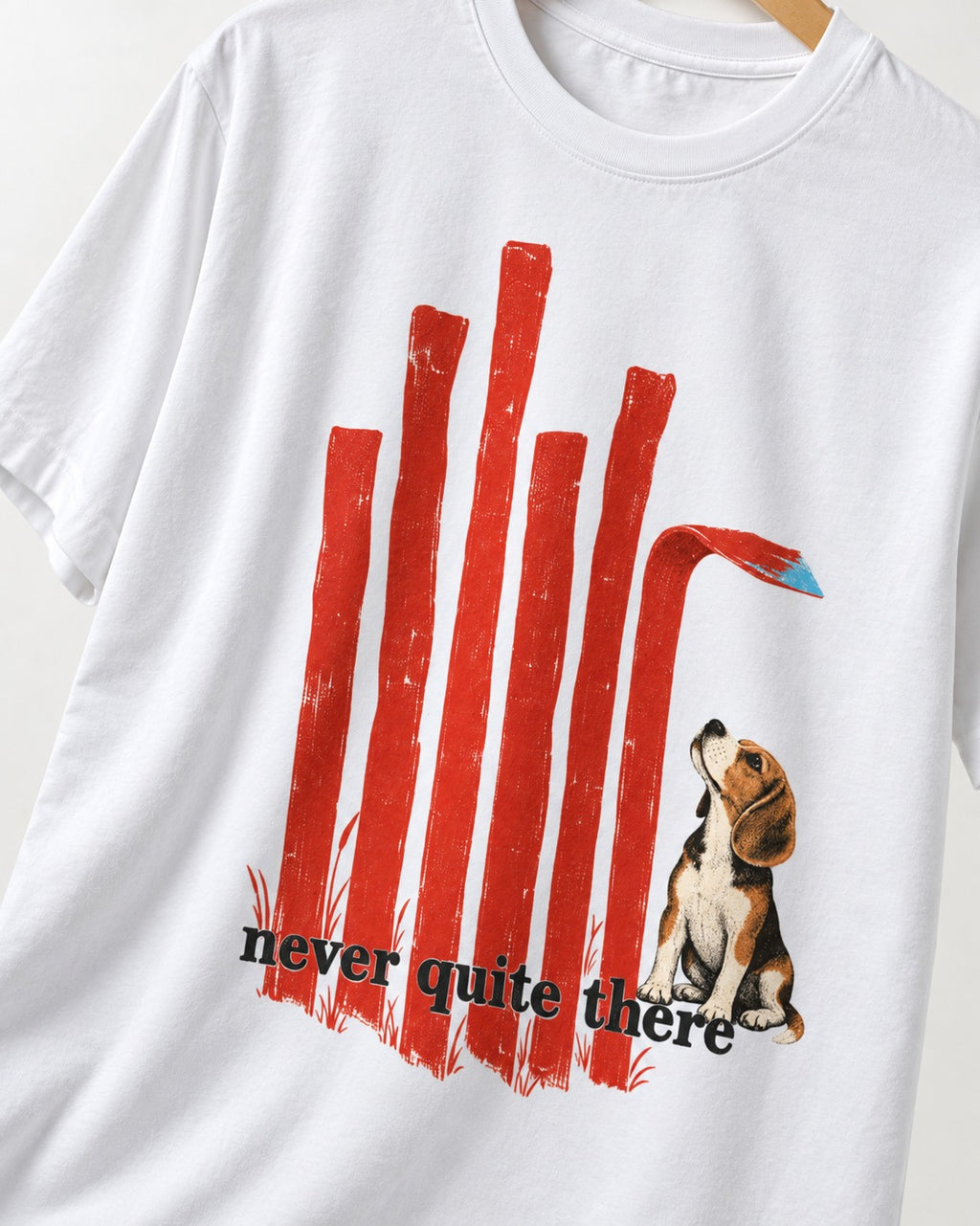 Never Quite There Beagle Red Bars T-Shirt in White, close-up of the graphic