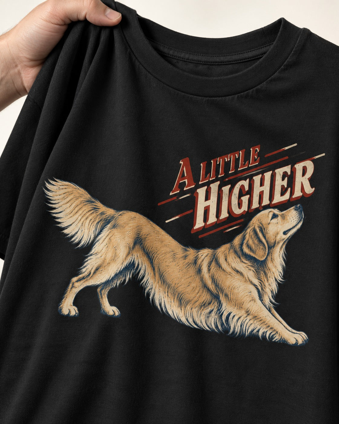 Golden Retriever A Little Higher Play Bow Graphic T-Shirt in Black, close-up of the graphic