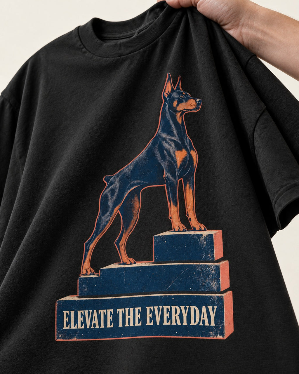 Doberman Elevate the Everyday Podium Graphic T-Shirt in Black, close-up of the graphic