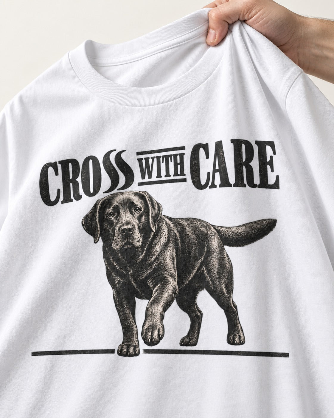 Labrador Retriever Cross with Care T-Shirt in White, close-up of the graphic