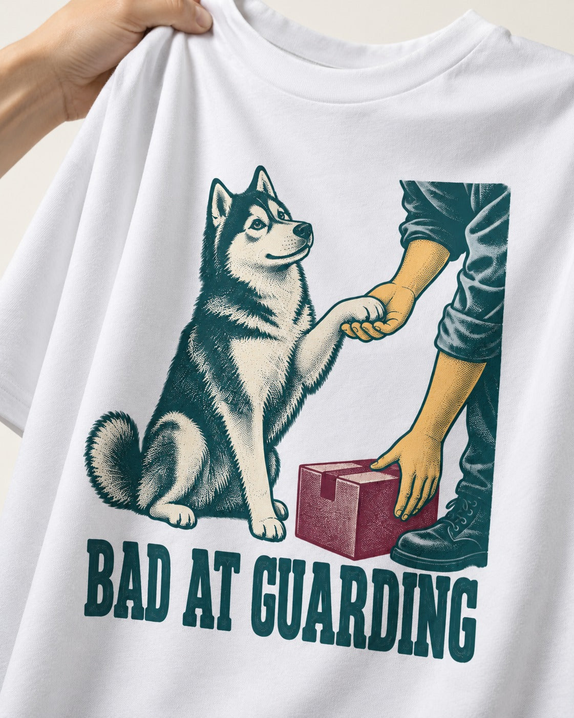 Husky's Bad at Guarding T-Shirt in White, close-up of the graphic