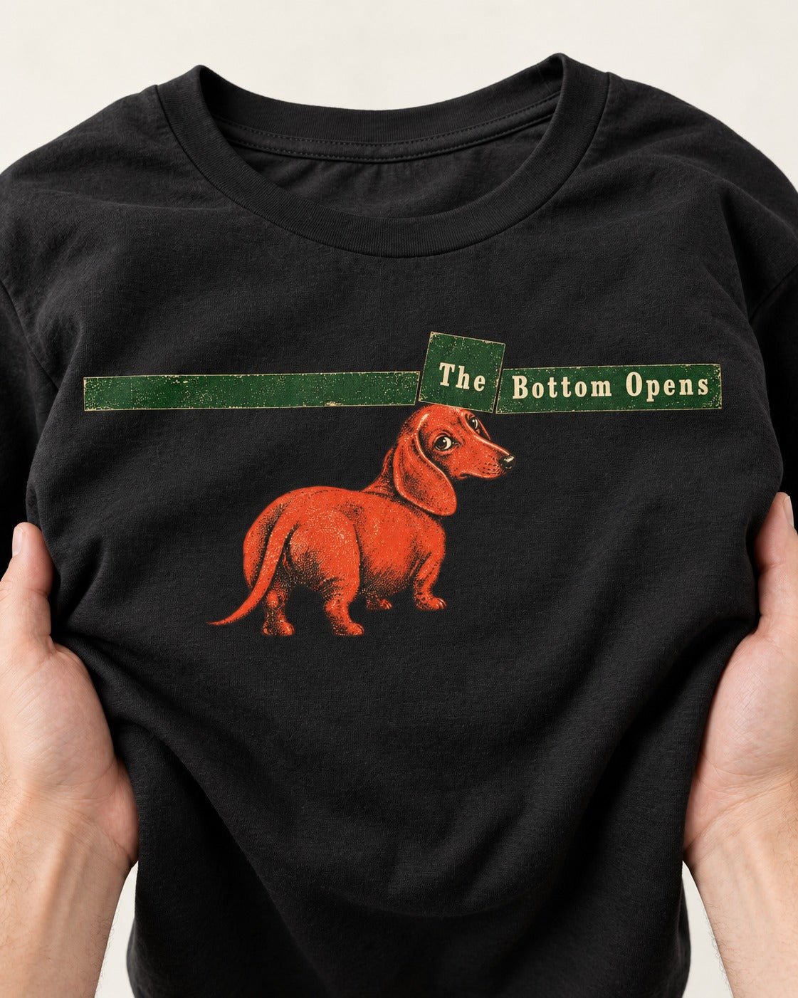 Dachshund The Bottom Opens Signpost Graphic T-Shirt in Black, close-up of the graphic