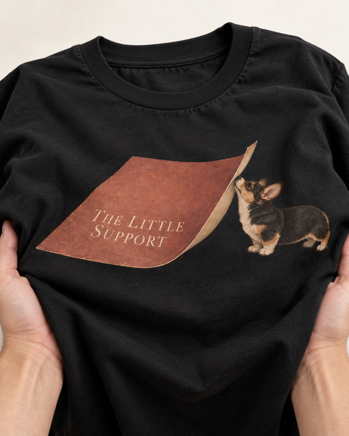 Corgi The Little Support Paper Graphic T-Shirt in Black, close-up of the graphic