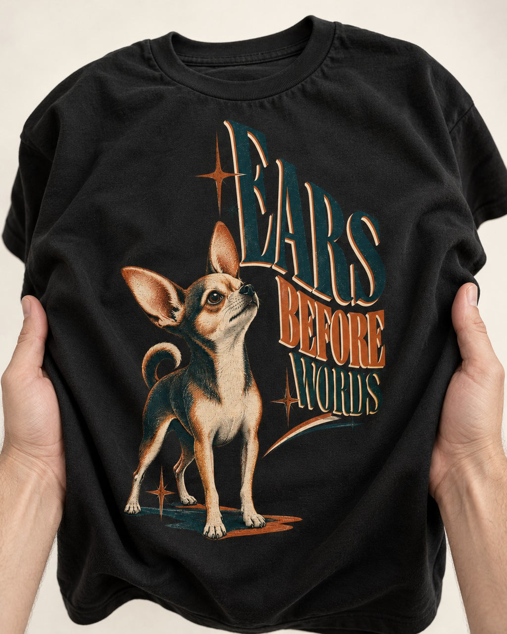 Chihuahua Ears Before Words Retro Typography T-Shirt in Black, close-up of the graphic