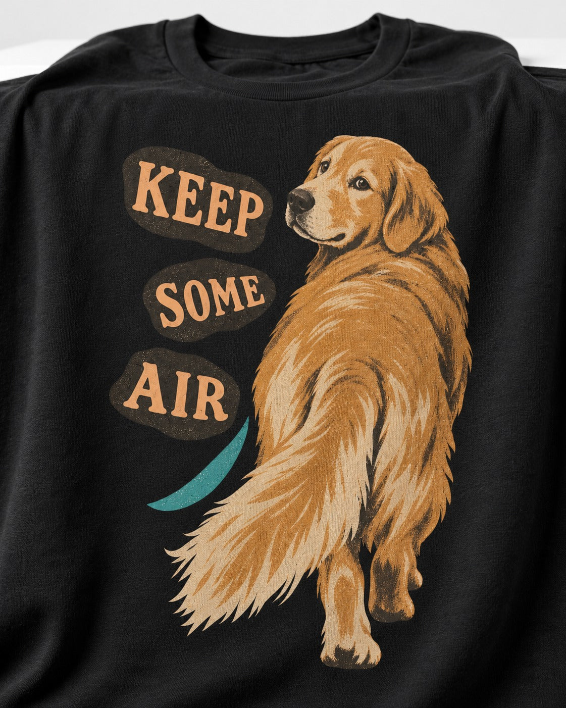 Golden Retriever Keep Some Air Looking Back Graphic T-Shirt in Black, close-up of the graphic