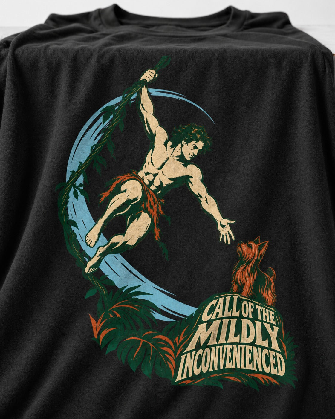 Yorkshire Terrier Call of the Mildly Inconvenienced Vine Swing Graphic T-Shirt in Black, close-up of the graphic