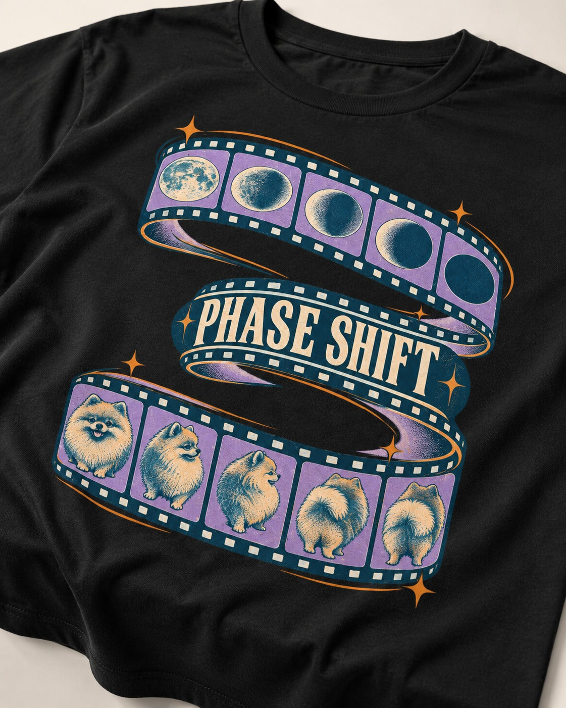 Pomeranian Phase Shift Filmstrip Graphic T-Shirt in Black, close-up of the graphic
