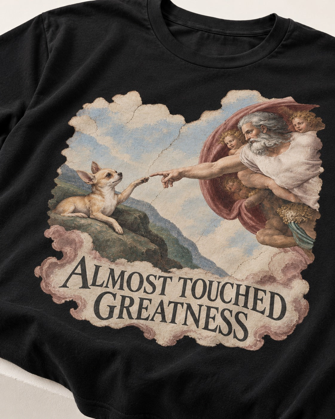 Chihuahua Almost Touched Greatness Renaissance Parody T-Shirt in Black, close-up of the graphic