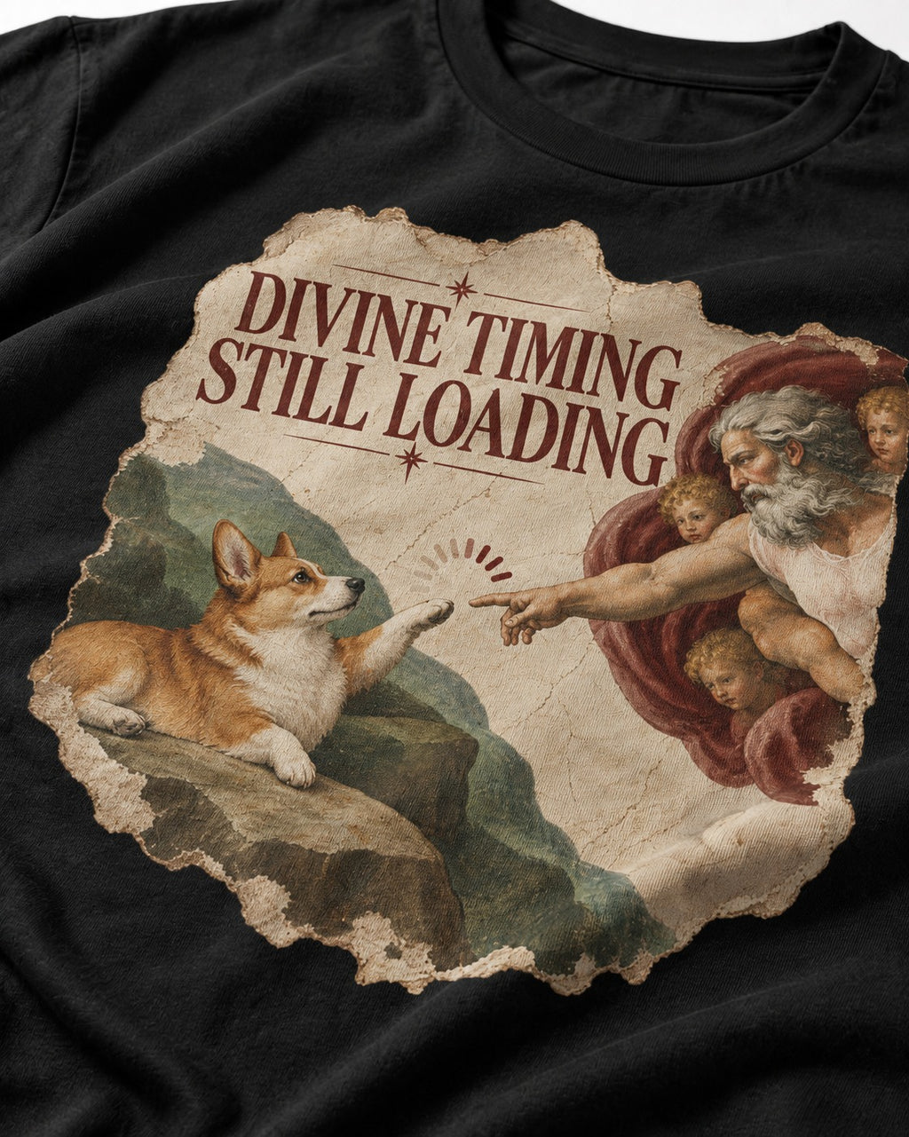 Corgi Divine Timing Still Loading Creation Parody T-Shirt in Black, close-up of the graphic