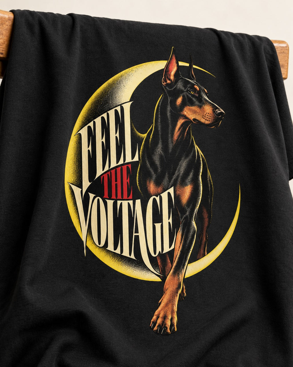 Doberman Feel the Voltage Crescent Portrait Graphic T-Shirt in Black, close-up of the graphic