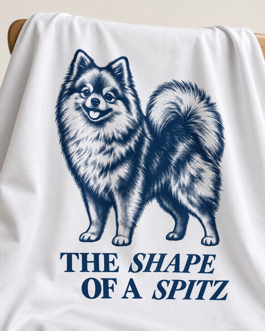The Shape of a Pomeranian T-Shirt in White, close-up of the graphic