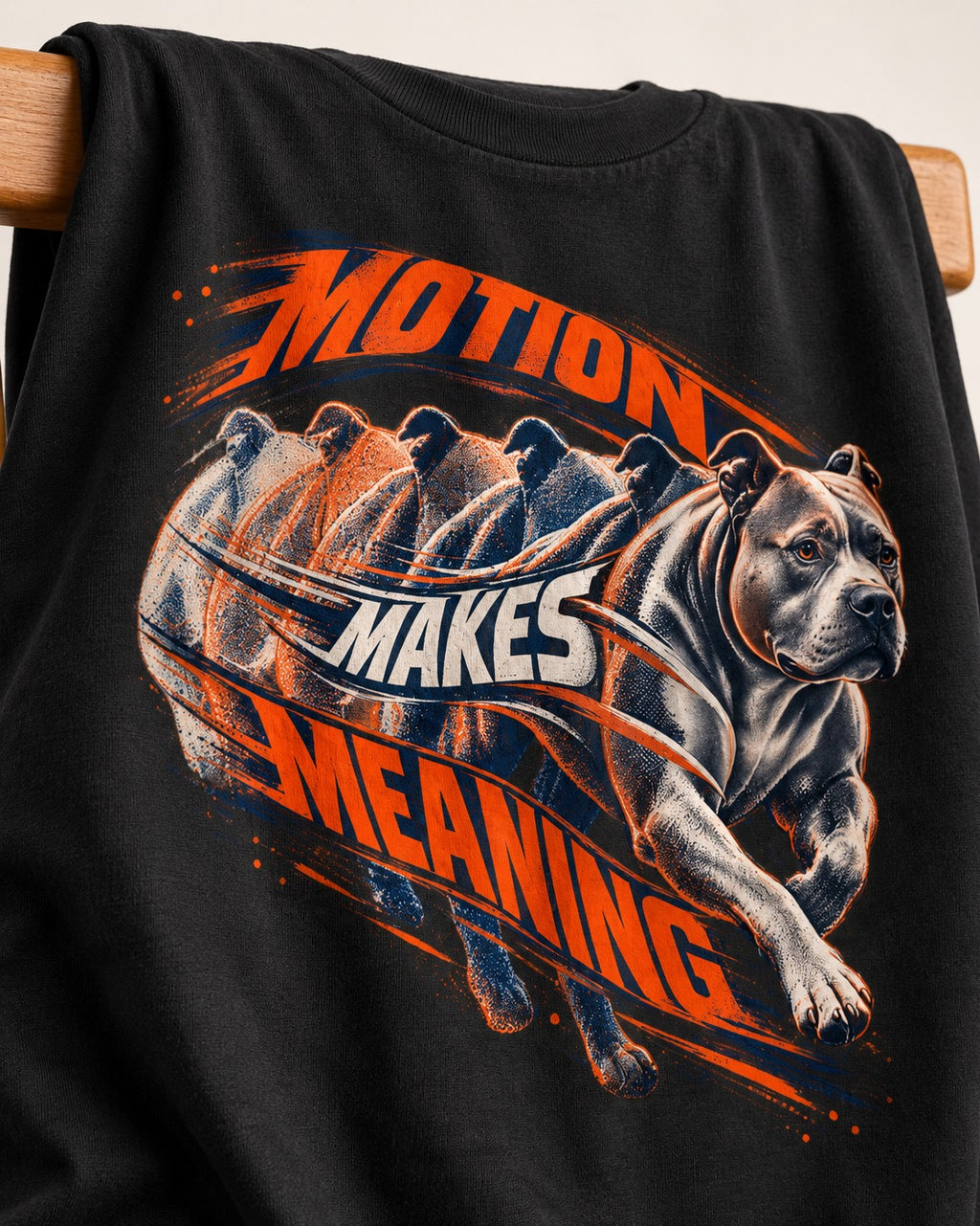 Pitbull Motion Makes Meaning Running Dog Graphic T-Shirt in Black, close-up of the graphic