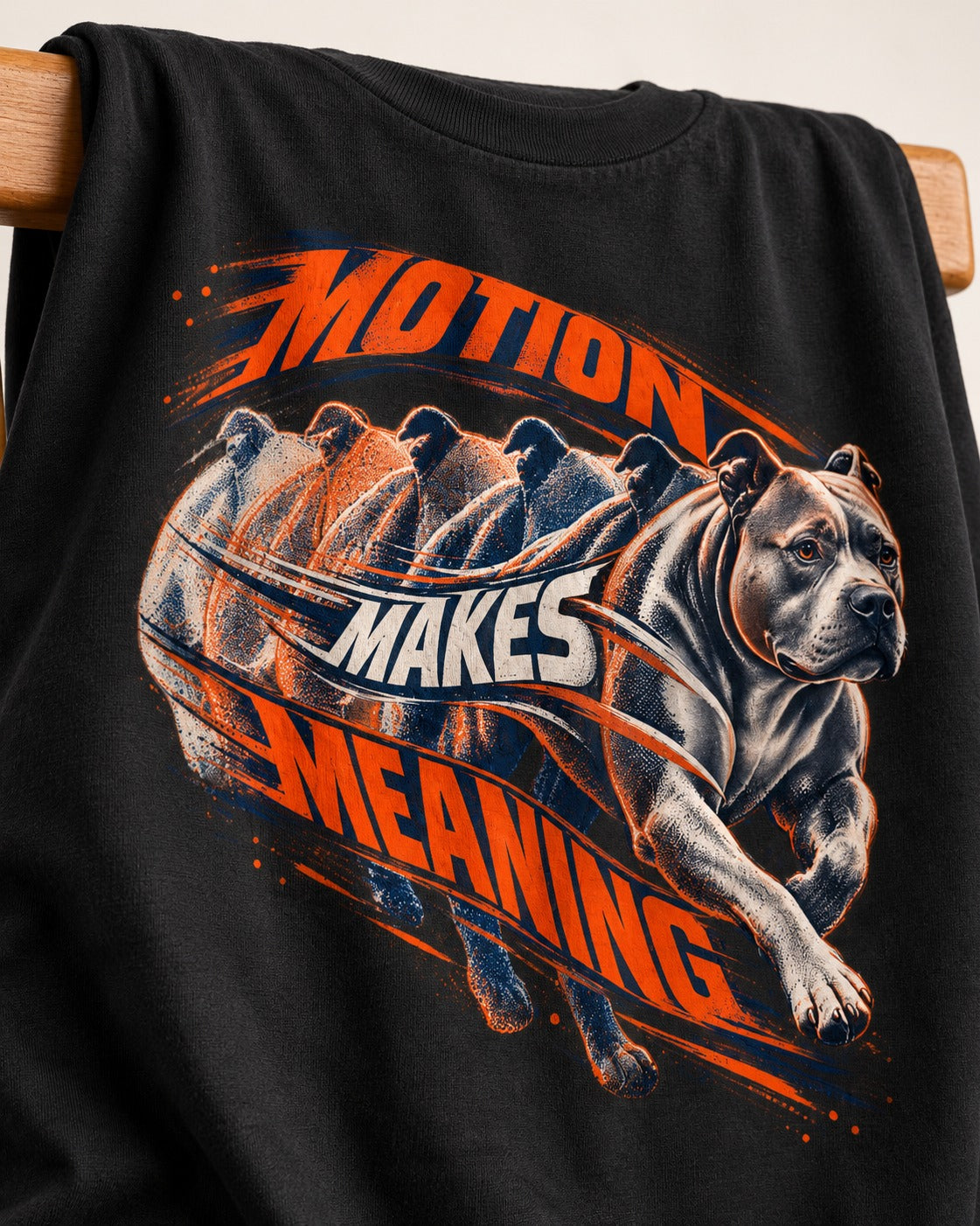 Pitbull Motion Makes Meaning Running Dog Graphic T-Shirt in Black, close-up of the graphic