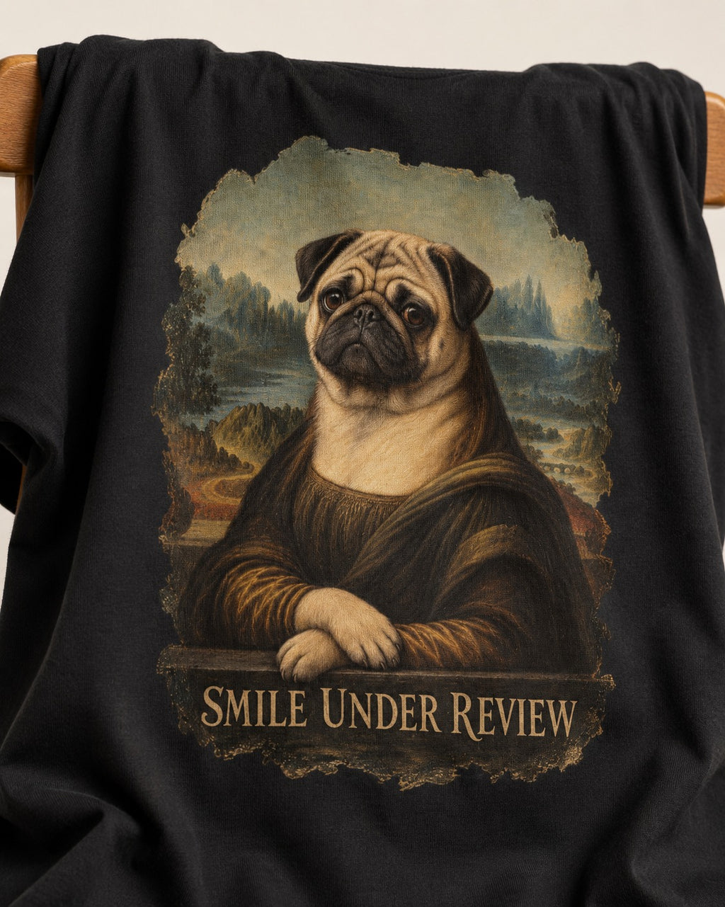 Pug Smile Under Review Mona Lisa Graphic T-Shirt in Black, close-up of the graphic
